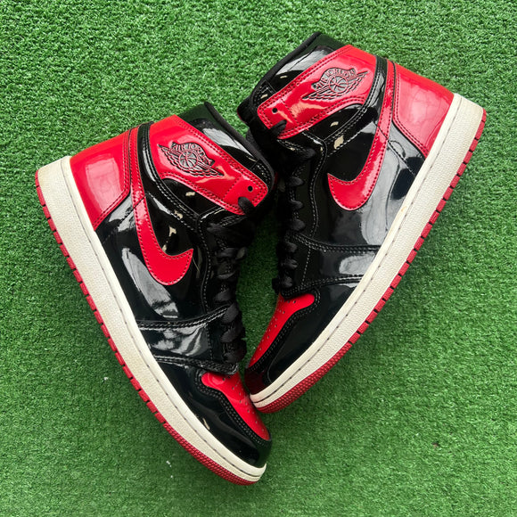 Jordan Patent Bred 1s Size 9