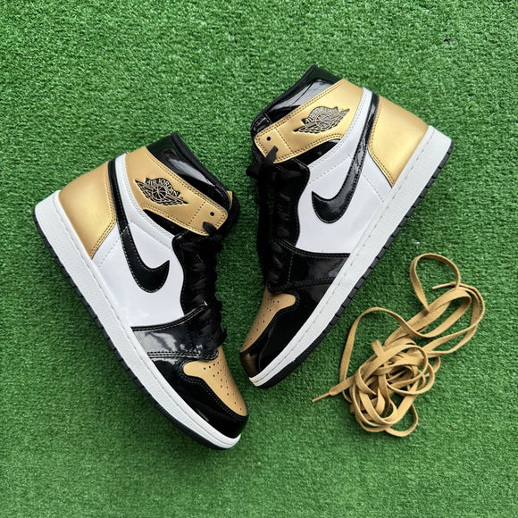 Jordan Patent Gold Toe 1s Size 10.5