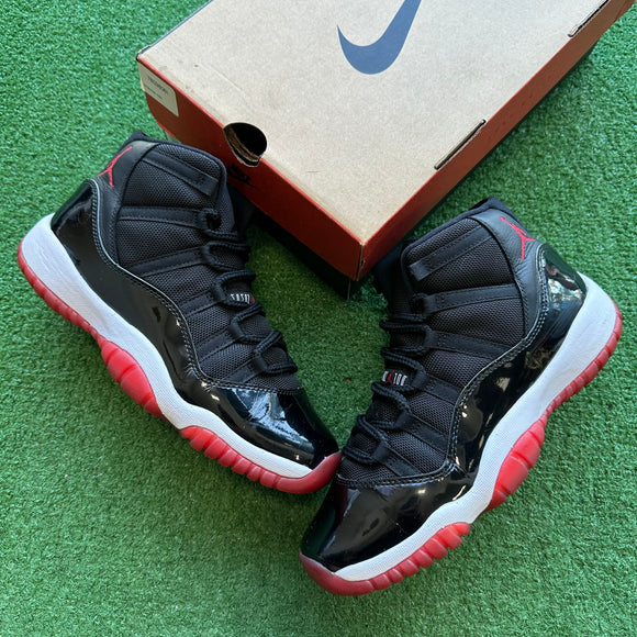 Jordan Bred 11s Size 7Y